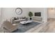 Modern living room with stylish furnishings, light wood-look floors, and a comfortable seating area at 19466 E 59Th Dr, Aurora, CO 80019
