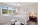 Charming bedroom with large window seat, decorative pillows and a relaxing atmosphere at 31402 N Bermuda Dunes Dr, Evergreen, CO 80439