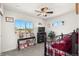 This bedroom features large windows, vintage decor and carpet flooring at 12794 Tamarac St, Thornton, CO 80602
