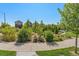 Scenic view of the neighborhood featuring lush landscaping and well-maintained homes at 12794 Tamarac St, Thornton, CO 80602