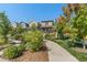 Beautifully landscaped home with a charming front yard and a inviting walkway at 12794 Tamarac St, Thornton, CO 80602