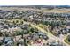 Charming suburban homes nestled within a serene neighborhood with mountain views and lush trees at 10908 Oakshire Ave, Highlands Ranch, CO 80126