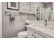 Contemporary bathroom with modern fixtures, marble countertops, and a glass-enclosed shower at 10908 Oakshire Ave, Highlands Ranch, CO 80126