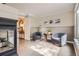 Cozy living room featuring a fireplace and comfortable seating at 10908 Oakshire Ave, Highlands Ranch, CO 80126