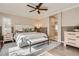 Spacious primary bedroom with a trey ceiling and ensuite bathroom at 10908 Oakshire Ave, Highlands Ranch, CO 80126