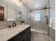 Modern bathroom with a glass-enclosed shower, sleek vanity, and stylish fixtures at 31756 Buffalo Park Rd, Evergreen, CO 80439