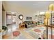 Cozy living room with hardwood floors and an area rug at 345 Central Ave, Brighton, CO 80601