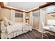 Comfortable bedroom featuring carpet and a small desk in the corner at 7131 Raritan St, Denver, CO 80221