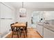 Dining area showcasing a dining table set that connects to the living room and kitchen at 7131 Raritan St, Denver, CO 80221