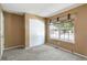 Tan bedroom with a light blocking shade over a large window and plush carpeting at 16141 W 64Th Way, Arvada, CO 80007