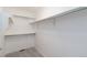 Walk-in closet with built-in shelving and clothing rods, offering ample storage space at 16141 W 64Th Way, Arvada, CO 80007