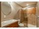 Bathroom featuring a sliding door shower, vanity with a granite countertop, and a toilet at 19099 E Creekside Dr, Parker, CO 80134