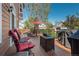 Relax on this backyard deck, featuring comfortable seating and a barbecue grill at 19099 E Creekside Dr, Parker, CO 80134