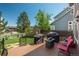 A well-maintained deck offers relaxation space and overlooks the backyard at 19099 E Creekside Dr, Parker, CO 80134