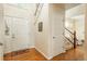 Foyer with hardwood floors and staircase at 19099 E Creekside Dr, Parker, CO 80134