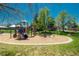 A colorful community playground with slides and swings offers a fun recreation area at 19099 E Creekside Dr, Parker, CO 80134