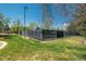 Well-maintained community tennis courts surrounded by lush greenery at 19099 E Creekside Dr, Parker, CO 80134