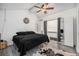 Stylish bedroom with high ceilings and unique details, features wood-look floors and modern decor at 2005 S Helena St # G, Aurora, CO 80013