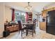 Eat-in kitchen area offers a cozy dining space with natural light and ample room for gatherings at 17675 E Girard Ave, Aurora, CO 80013