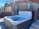 Close-up of a modern hot tub on a patio, showcasing its pristine condition and inviting design at 17675 E Girard Ave, Aurora, CO 80013