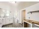 Bright living space with an open layout and stylish flooring that connects to the kitchen at 7101 E 66Th Ave, Commerce City, CO 80022