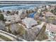 Spacious home with a three-car garage and deck overlooking a partially frozen lake at 6790 W Crestline Ave, Littleton, CO 80123