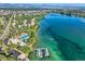 Overhead shot of community pool, clubhouse, docks, and neighborhood on a lake at 6790 W Crestline Ave, Littleton, CO 80123