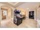 Finished basement featuring an arcade game, seating area and home theater at 6790 W Crestline Ave, Littleton, CO 80123
