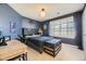 Bedroom with desk, trunk, and window with views at 6790 W Crestline Ave, Littleton, CO 80123