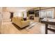 Finished basement featuring a fireplace, built-ins, and living room seating at 6790 W Crestline Ave, Littleton, CO 80123