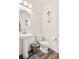 Stylish half bathroom featuring a modern sink and vanity, perfect for guests and everyday convenience at 9248 Salida St, Commerce City, CO 80022