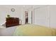 This bedroom has carpet, a closet, and a wood dresser at 9248 Salida St, Commerce City, CO 80022