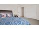 This bedroom features carpet, a closet, and a small glass table at 9248 Salida St, Commerce City, CO 80022