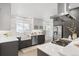 Modern kitchen with stainless steel appliances and ample counter space at 3052 S Logan St, Englewood, CO 80113