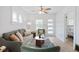 Comfortable living room with stylish decor and ample natural light at 3052 S Logan St, Englewood, CO 80113
