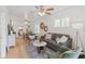 Bright living room with hardwood floors and modern furnishings at 3052 S Logan St, Englewood, CO 80113