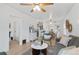 Spacious living room seamlessly connects to the dining area and kitchen at 3052 S Logan St, Englewood, CO 80113