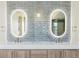 Close-up on bathroom double sink vanity with stone counters and pendant lights at 5145 S Kearney Ct, Greenwood Village, CO 80111