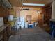 Large garage, workbench, cabinets, and shelving at 5621 Demott Ave, Commerce City, CO 80022