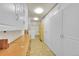 Bright laundry room with washer, dryer, and ample cabinetry at 5621 Demott Ave, Commerce City, CO 80022