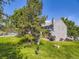 Enjoy the spacious backyard and pool access; perfect for relaxation and outdoor fun at 9736 W Cornell Pl, Lakewood, CO 80227
