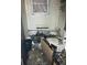 Bathroom view of a fire-damaged, bathroom in need of complete renovation at 1165 S Winona Ct, Denver, CO 80219
