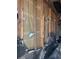 Exposed wall framing with wires and fire damage at 1165 S Winona Ct, Denver, CO 80219