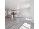 Open floor plan showcases the bright living space with hard surface floors at 25023 N 34Th Ave, Aurora, CO 80019