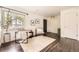Bright living room with modern furniture, large windows, and stylish decor at 2540 Kendall St, Edgewater, CO 80214