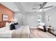 Comfortable bedroom with a ceiling fan, stylish decor, and neutral color scheme creates a relaxing space at 2383 Jasmine St, Denver, CO 80207