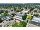 Stunning aerial view of a residential neighborhood with tree-lined streets and charming homes at 3482 E 28Th Ave, Denver, CO 80205