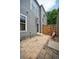 Backyard patio with pavers, privacy fence, and space for outdoor seating at 3482 E 28Th Ave, Denver, CO 80205
