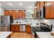 Bright kitchen with stainless steel appliances, plenty of cabinet storage, and white subway tile backsplash at 3482 E 28Th Ave, Denver, CO 80205