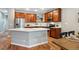 Modern kitchen features stainless steel appliances, white countertops, ample cabinetry, and a center island at 3482 E 28Th Ave, Denver, CO 80205